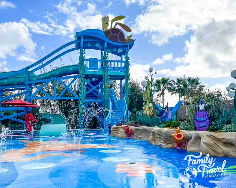 Finding Nemo themed pool with waterslide and splash area 
