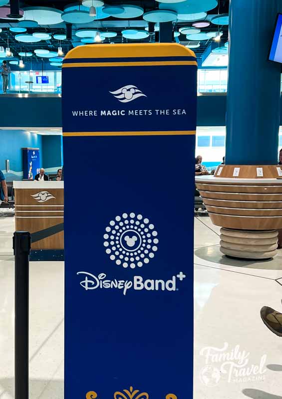 Banner sign advertising the Disneyband in the cruise port