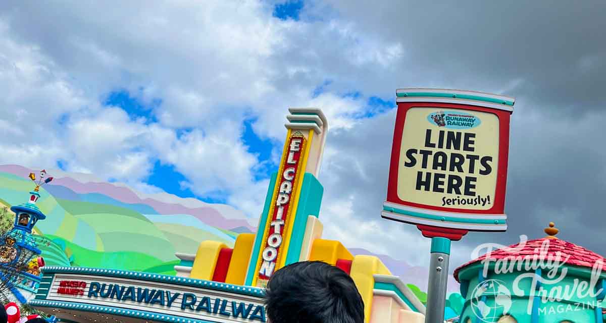 Entrance to Mickey and Minnie's Runaway Railway with "Line Starts Here" sign 