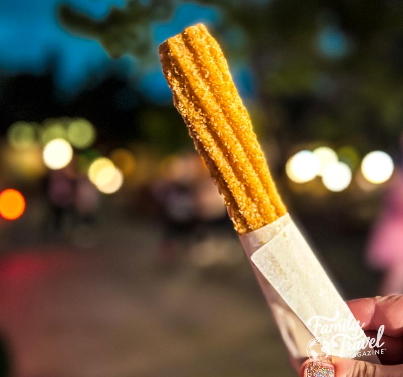 Churro with paper wrap on th ebotton