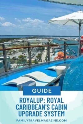 View from a Royal Caribbean cruise ship featuring a poolside lounge area with curved white loungers, a large umbrella, and a scenic overlook of the port and ocean. Text overlay reads, “Guide: RoyalUp – Royal Caribbean’s Cabin Upgrade System – familytravelmagazine.com.