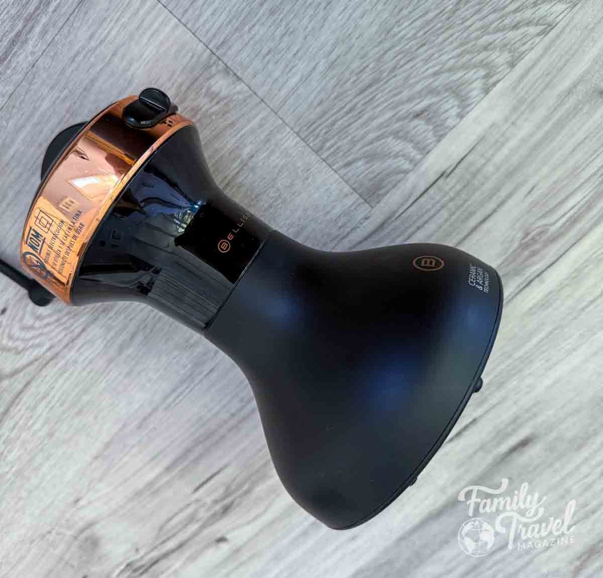 Compact travel hair dryer with built-in diffuser – an Amazon cruise must have for styling curly or wavy hair while saving space in your cruise cabin.
