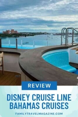 Disney Cruise Line Bahamas cruise review pin featuring infinity pool view of Nassau and Atlantis Resort, Family Travel Magazine branding.
