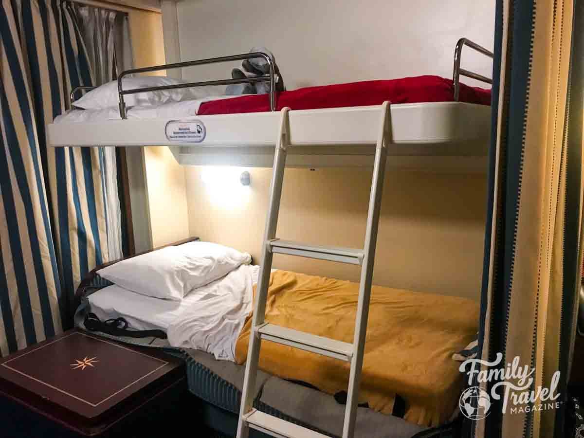 Disney Cruise Line family stateroom with bunk beds and ladder