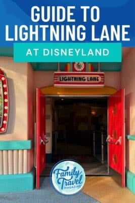 Disneylands colorful Lightning Lane entrance with open red doors and a Mickey Mouse clock above.