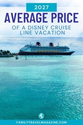 Disney Cruise Line ship at Castaway Cay, Bahamas, with a beach and clear blue water.