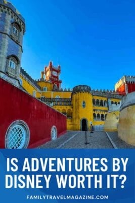 Pena Palace in Sintra, Portugal, featuring its vibrant red, yellow, and blue sections.