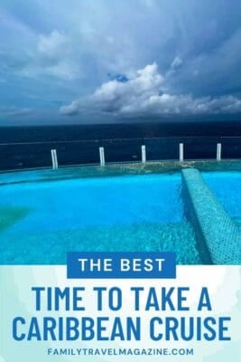 Infinity pool on a cruise ship overlooking the vast Caribbean Sea under a cloudy sky.