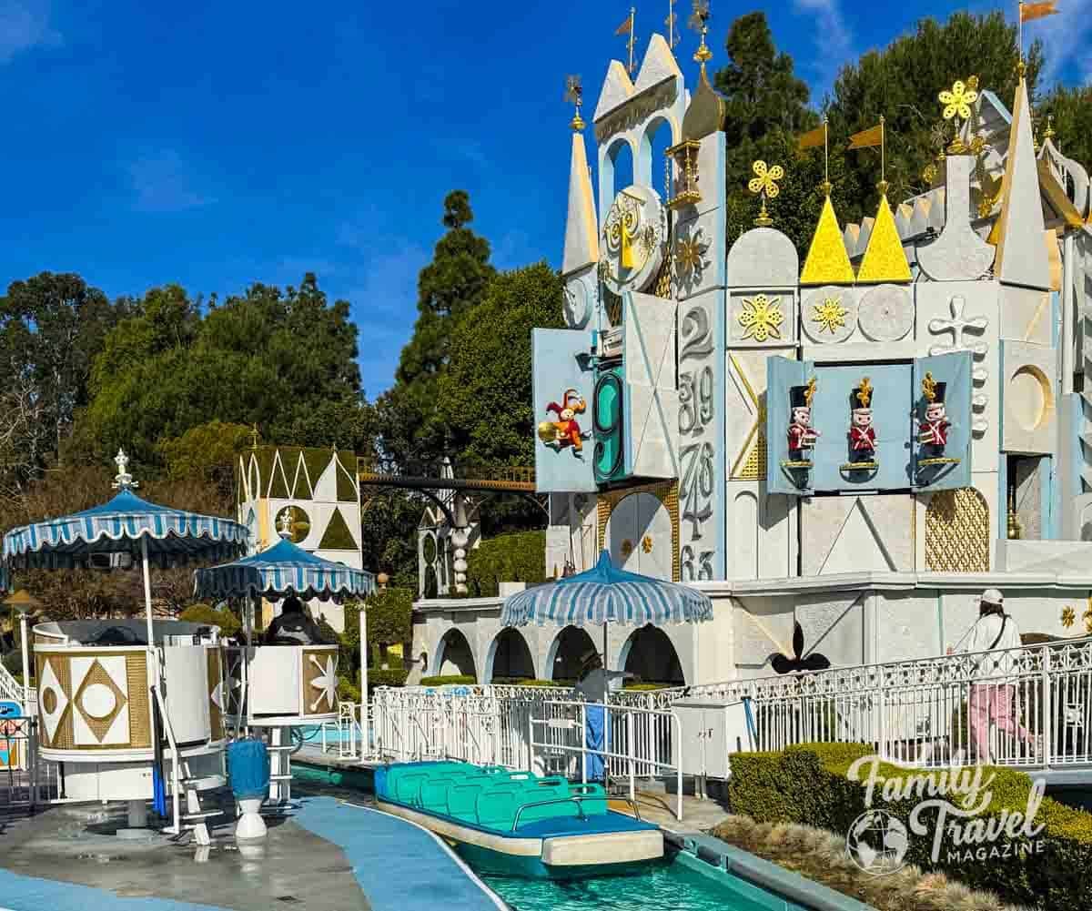 The whimsical clock tower and colorful boats of the its a small world ride at Disneyland.